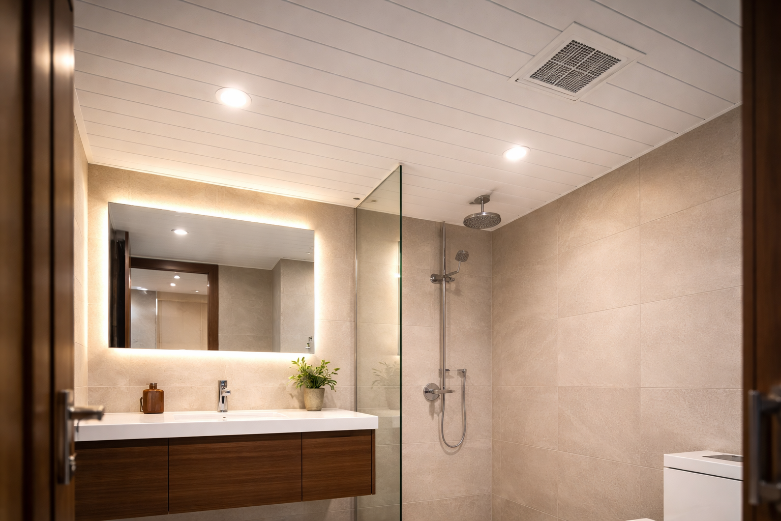 Modern bathroom with white PVC false ceiling panels and recessed lighting in Bangalore — Elysian False Ceiling